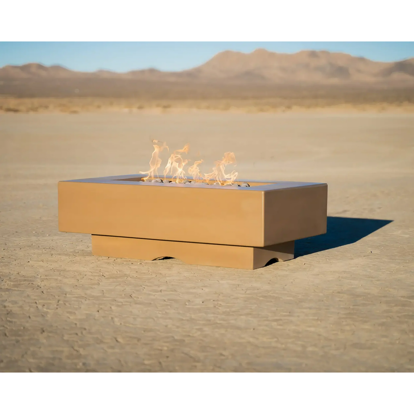 A chestnut colored Del Mar Ourdoor Fire Pit in the desert from a different angle