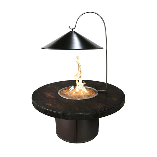 Black cone fire pit cover and heat reflector hanging above round fire pit