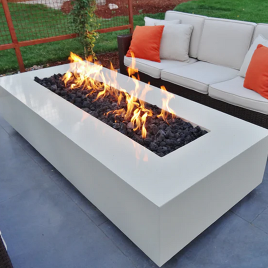 Outdoor patio setup with a fire pit table and sofa set on a patio.