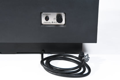 Black electronic device with a cable on a white background