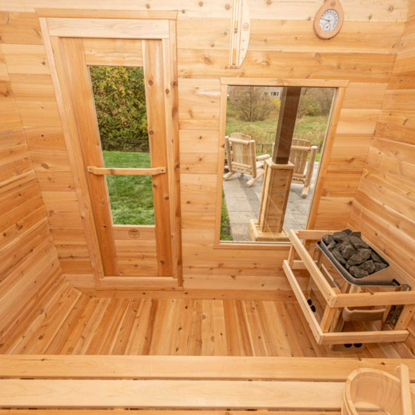 Dundalk Luna Sauna interior with large front window and cedar construction