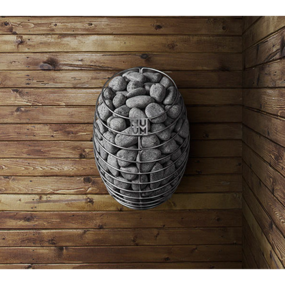 A wall-mounted electric sauna heater with a sleek, rounded design and stainless steel details, filled with sauna stones.